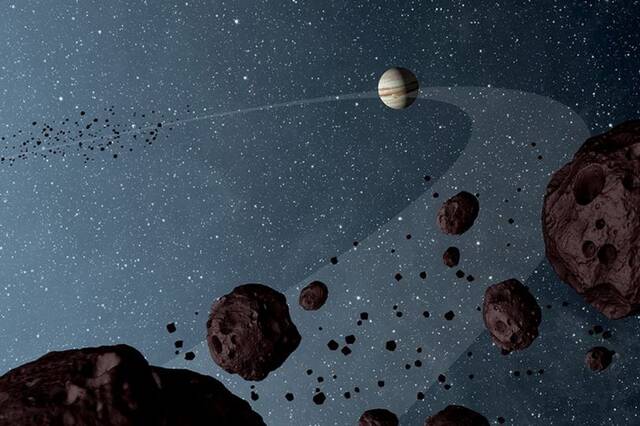 科学家为围绕木星的两个巨大小行星群的谜团提供新解释