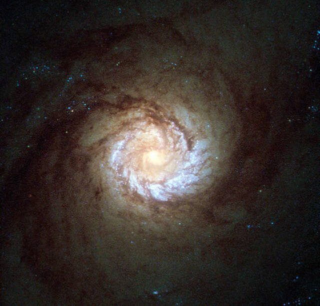 NGC4303星系正面图显示它的臂部充满活跃的恒星形成