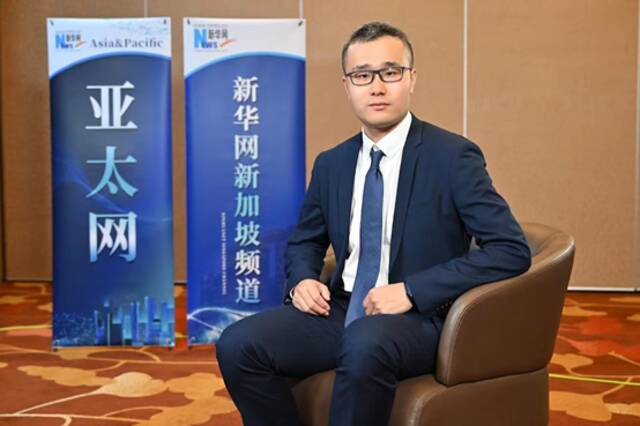图为卧龙电气驱动集团全球销售总部亚太区总裁吴鹏飞在接受新华网采访。（陈冰摄）