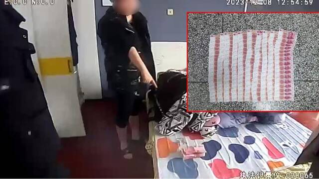 犯罪嫌疑人指认自己偷盗的现金。上海市公安局供图